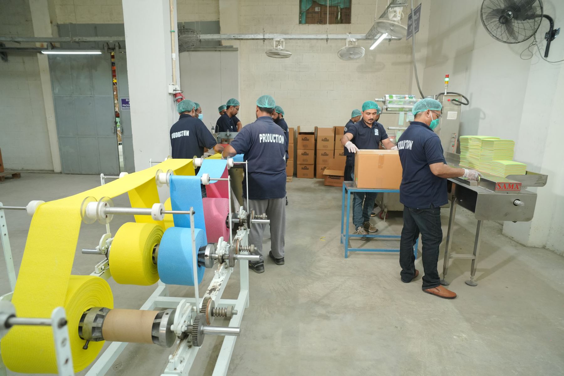 KIA staff operating machinery